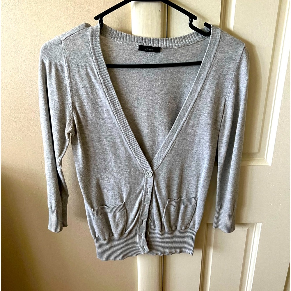 Active 3/4 sleeve cardigan. Free beauty gift with purchase!